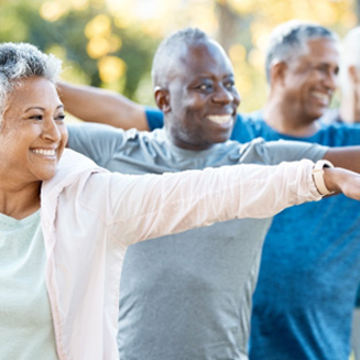 Adults smiling in workout class